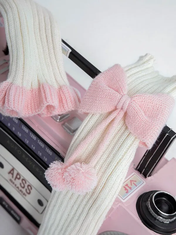 Girly bow pompon leg warmers