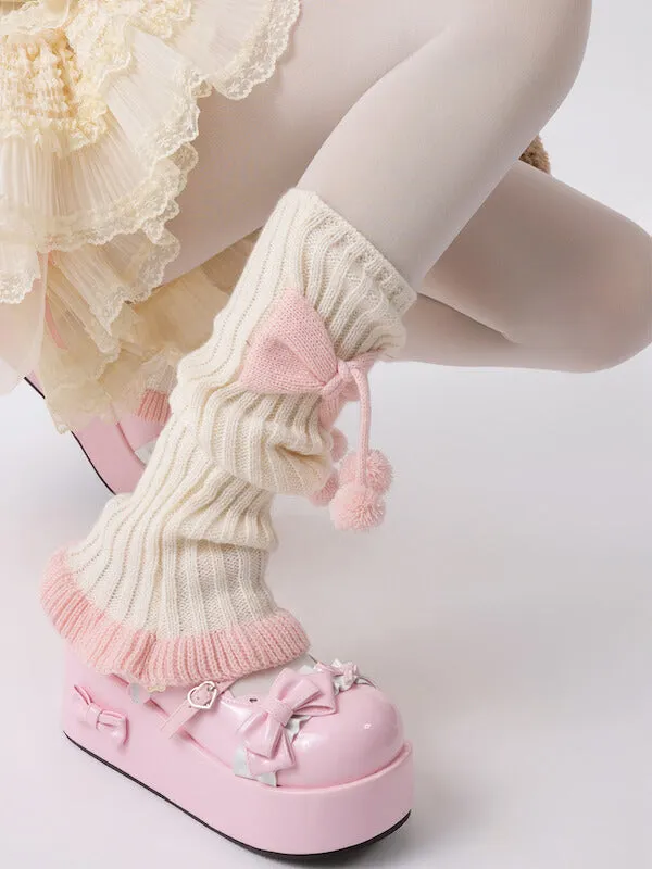 Girly bow pompon leg warmers